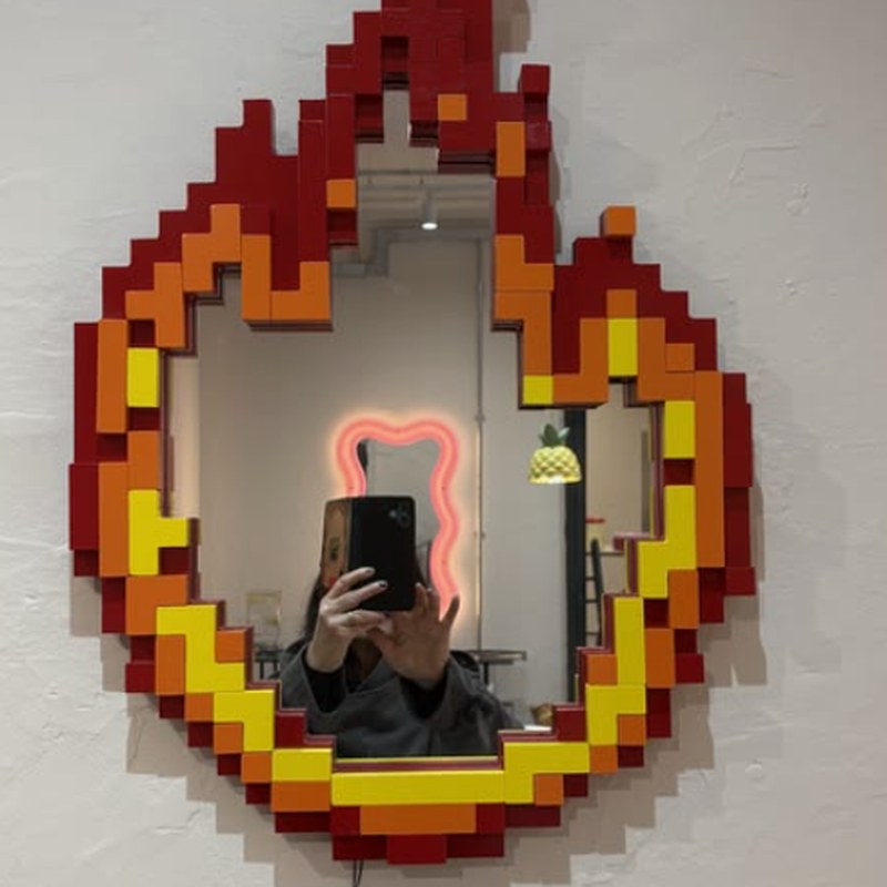 Pixel-fire mirror in a studio